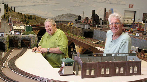 Working on the layouts is always fun! Just ask members Bob and John